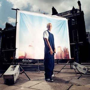 Eminem in the City Posing in front of a city screen