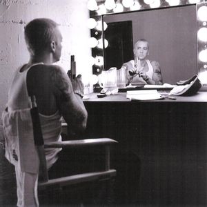 Eminem Encore 02 staring at the mirror with a gun