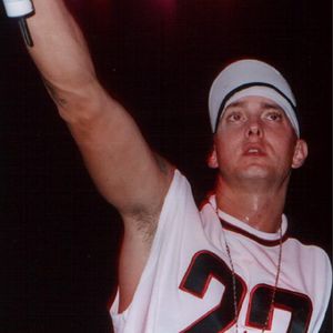 Eminem holding the mic all sweaty