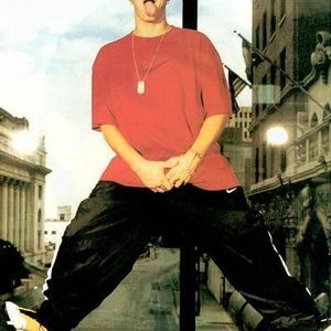 Eminem jumping and showing his tongue